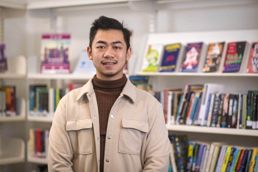 man in library